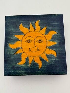 Bright Yellow Sun on Deep Blue Wooden Box